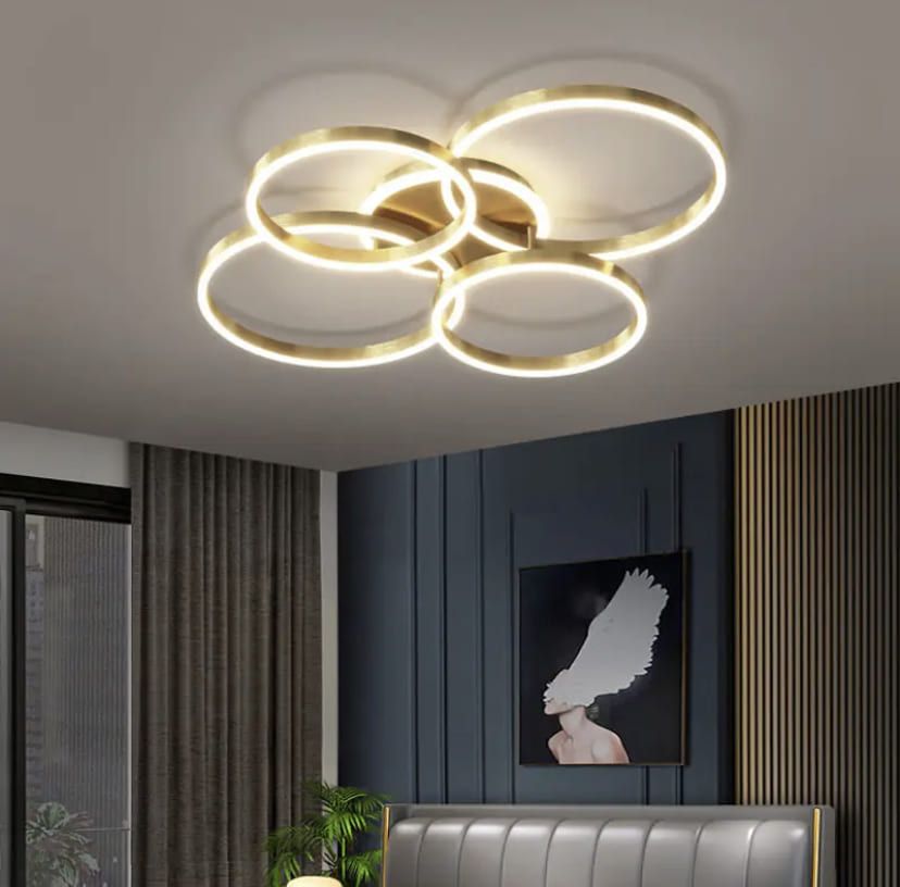 Золота стельова LED люстра Anelli на 4 кільця