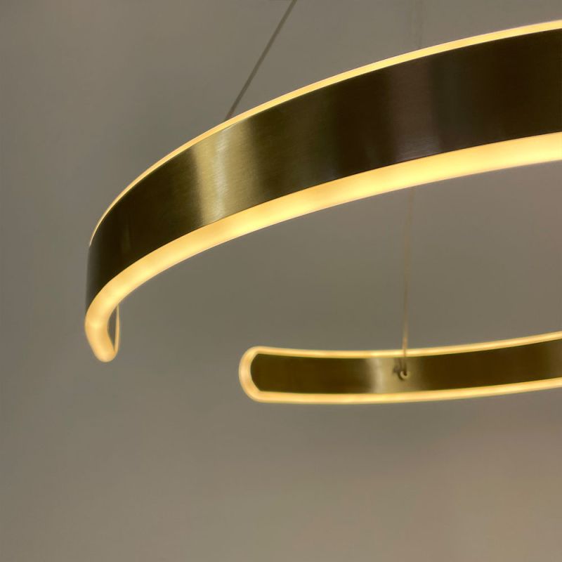 Підвісна латунна люстра Spiral Rings Ø 50 см